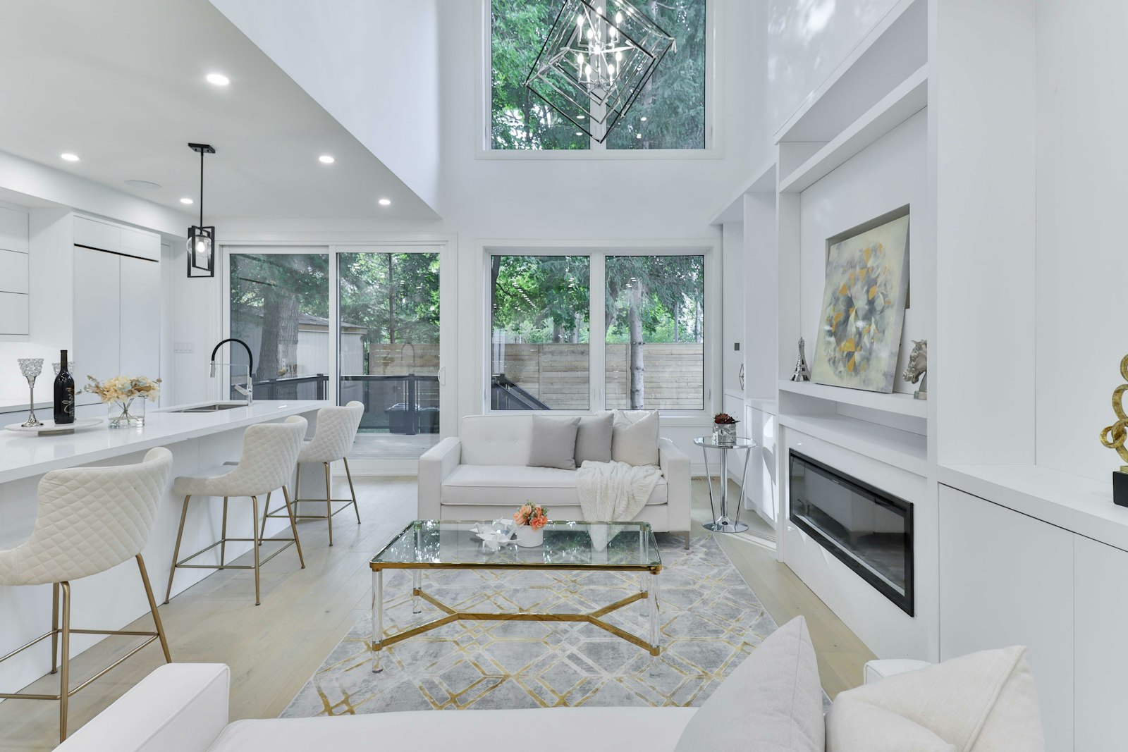 Bright open-plan living room with floor-to-ceiling windows