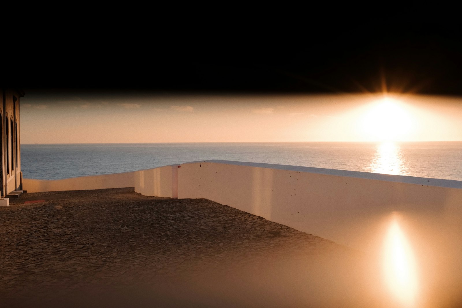 Infinity pool and outdoor terrace overlooking the landscape
